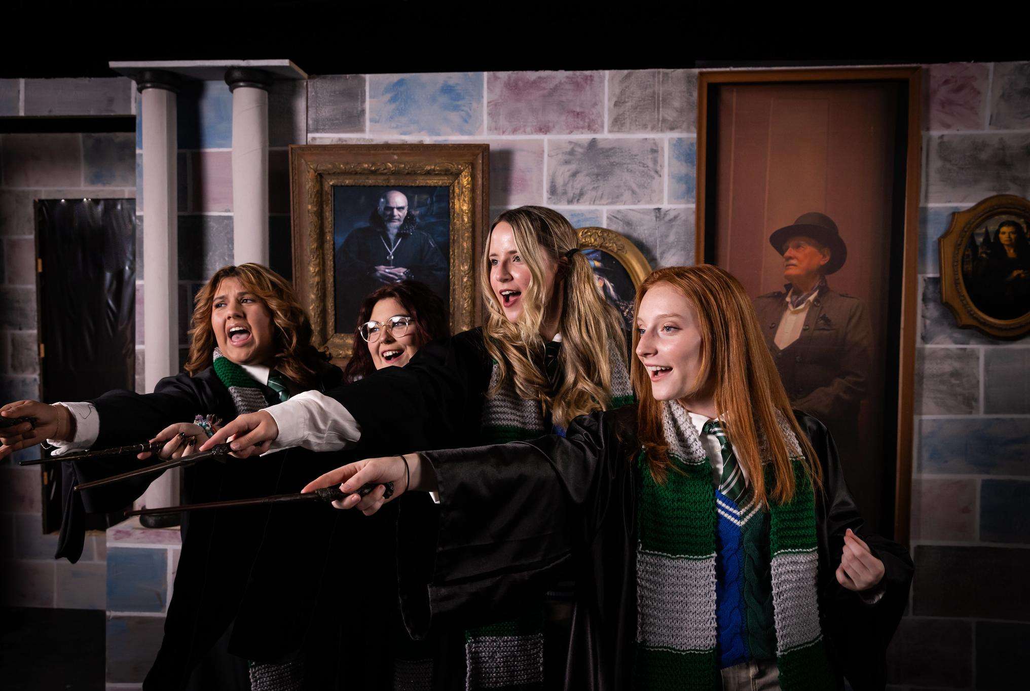 (From left) "Puffs" cast members Emery Meza, Shelby Fields, Emily Wilson, and Lillyan Kimberlin rehearse in the Fine Arts Auditorium earlier this fall.