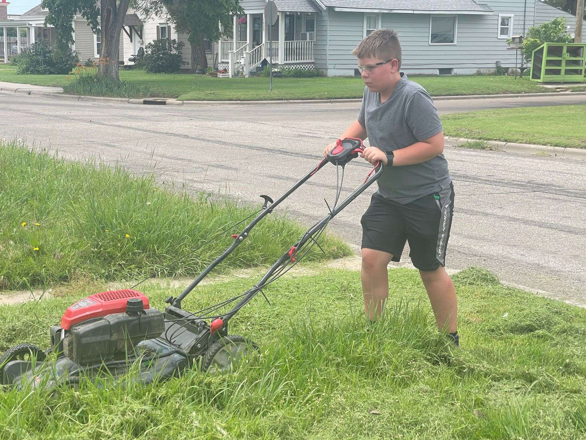 Few of the 50 yards Holinde mowed for the challenge were easy, especially in the summer heat.