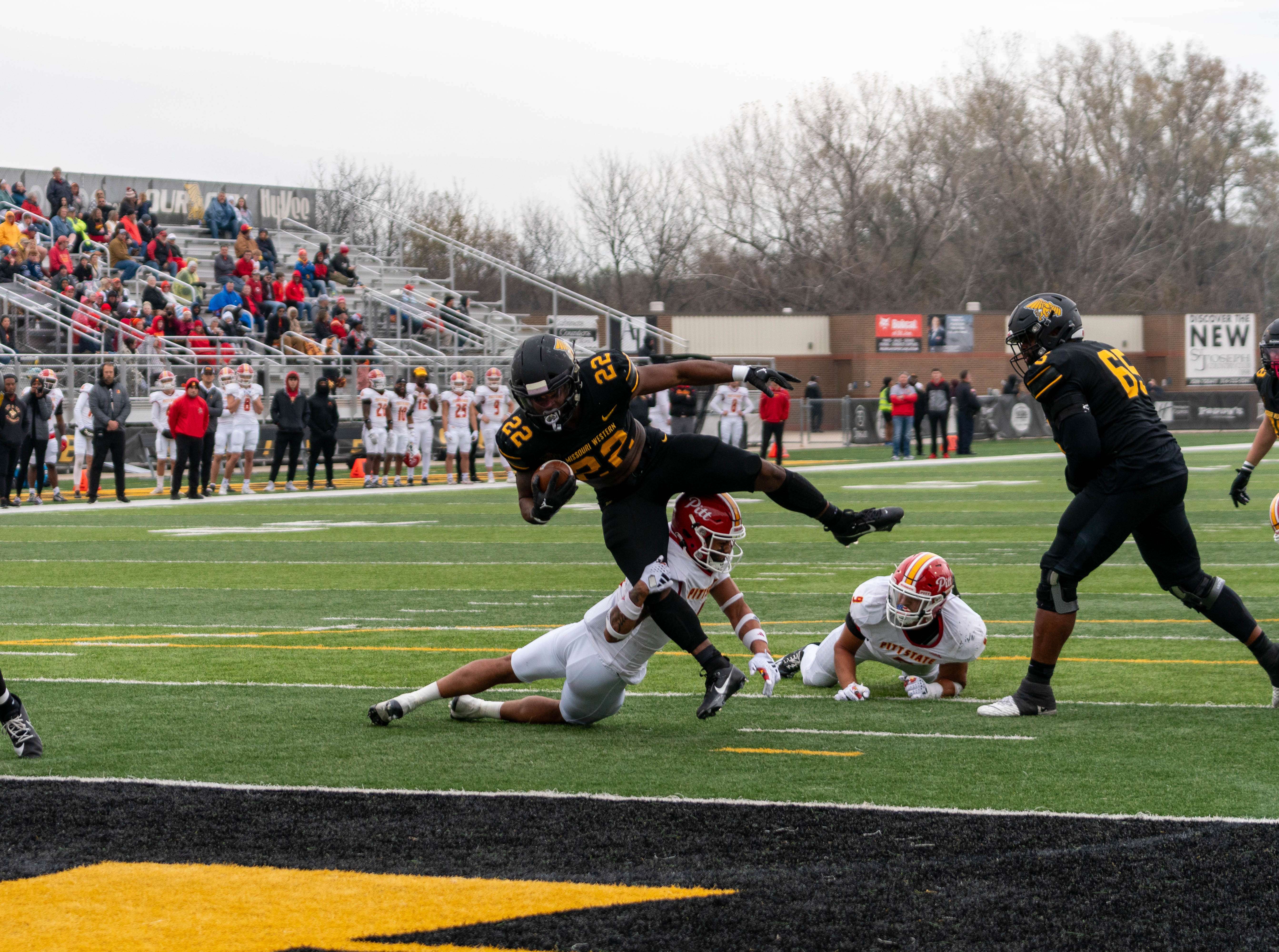 Seth Cromwell (22) scored two rushing touchdowns in Missouri Western's 31-30 win over No. 2 Pittsburg State at Spratt Stadium Saturday. Photo courtesy of MWSU athletics.