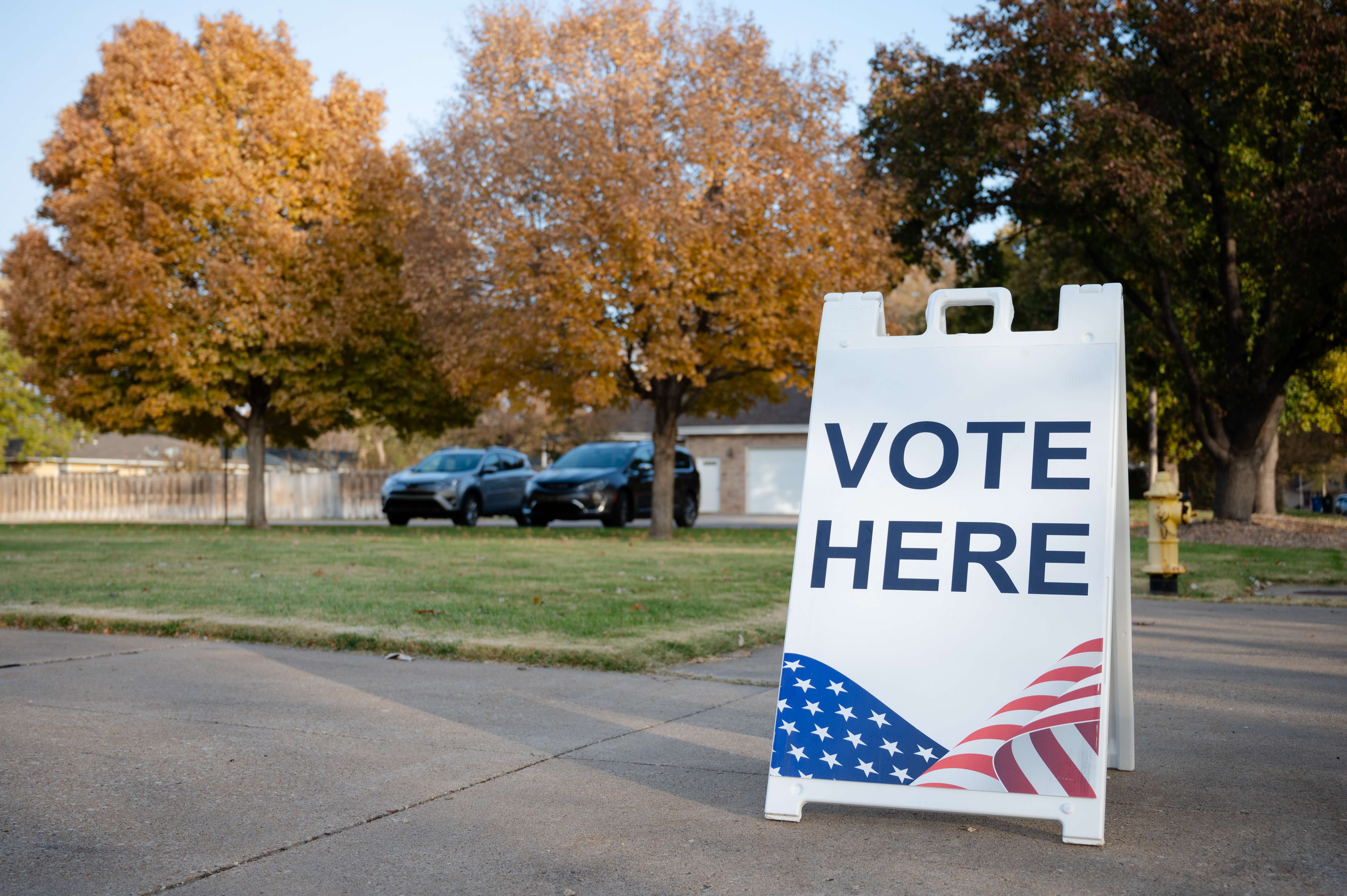 A "Vote Here" sign outside of the Church of the Cross United Methodist Church in Salina. Photo by Olivia Bergmeier