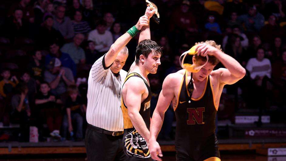 Fort Hays State's Cody Hicks is declared the winner of a wrestling match over Northern State's Chase Bloomquist in Aberdeem, South Dakota, Thursday, November 9, 2023. (FHSU Athletics photo/Cory Burdict/Northern State)