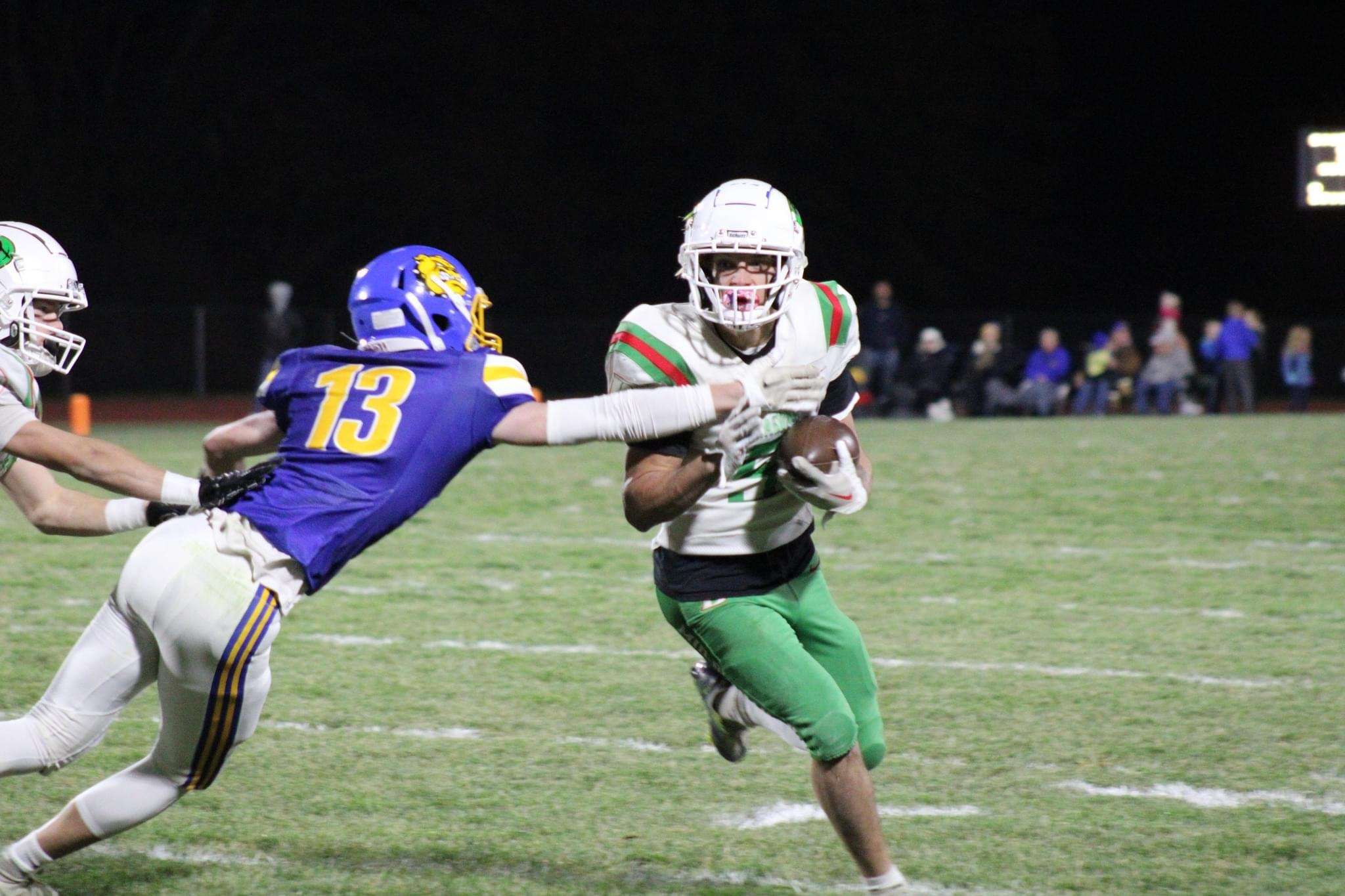 Aidan Rhoad (13) goes for a tackle on&nbsp;Ian Wegenka (5) 