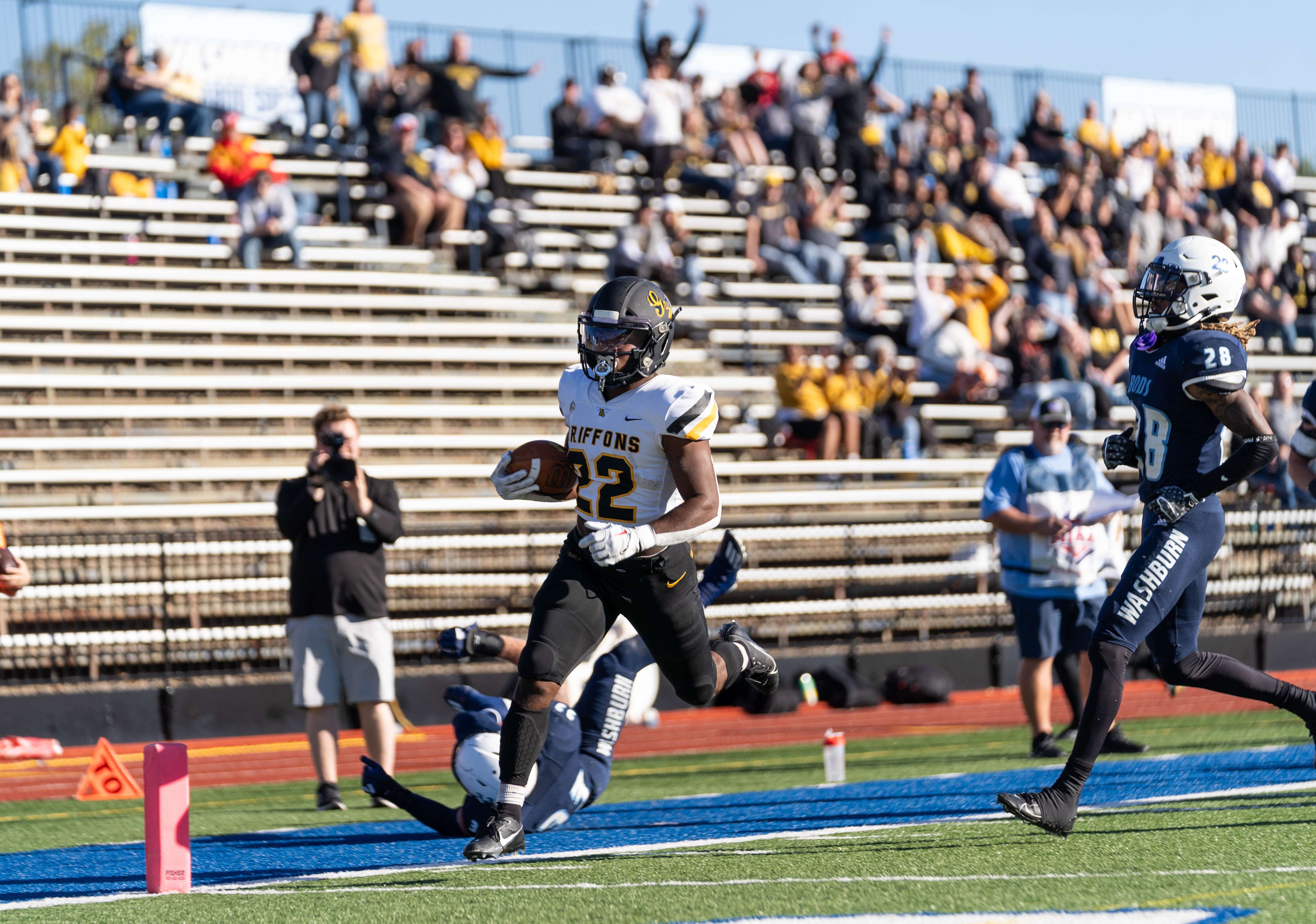 Seth Cromwell (22) tied his career-high with three rushing touchdowns on 32 carries Saturday. Courtesy photo.