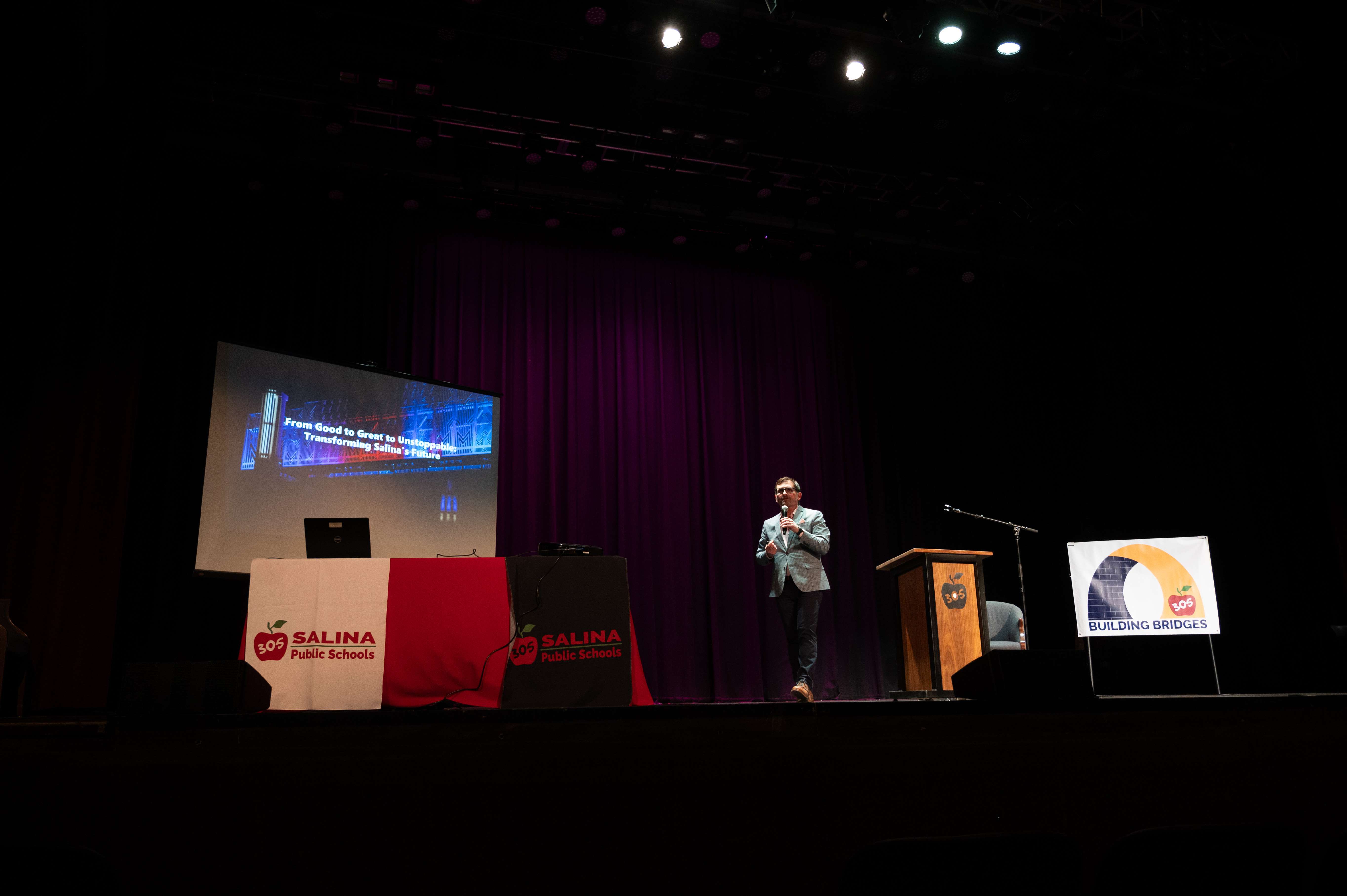 Travis Young talks about the "Salina Flywheel" during the third Building Bridges event on Thursday, Nov. 9 at the Stiefel Theatre in Salina. <b>Photo by Olivia Bergmeier</b>