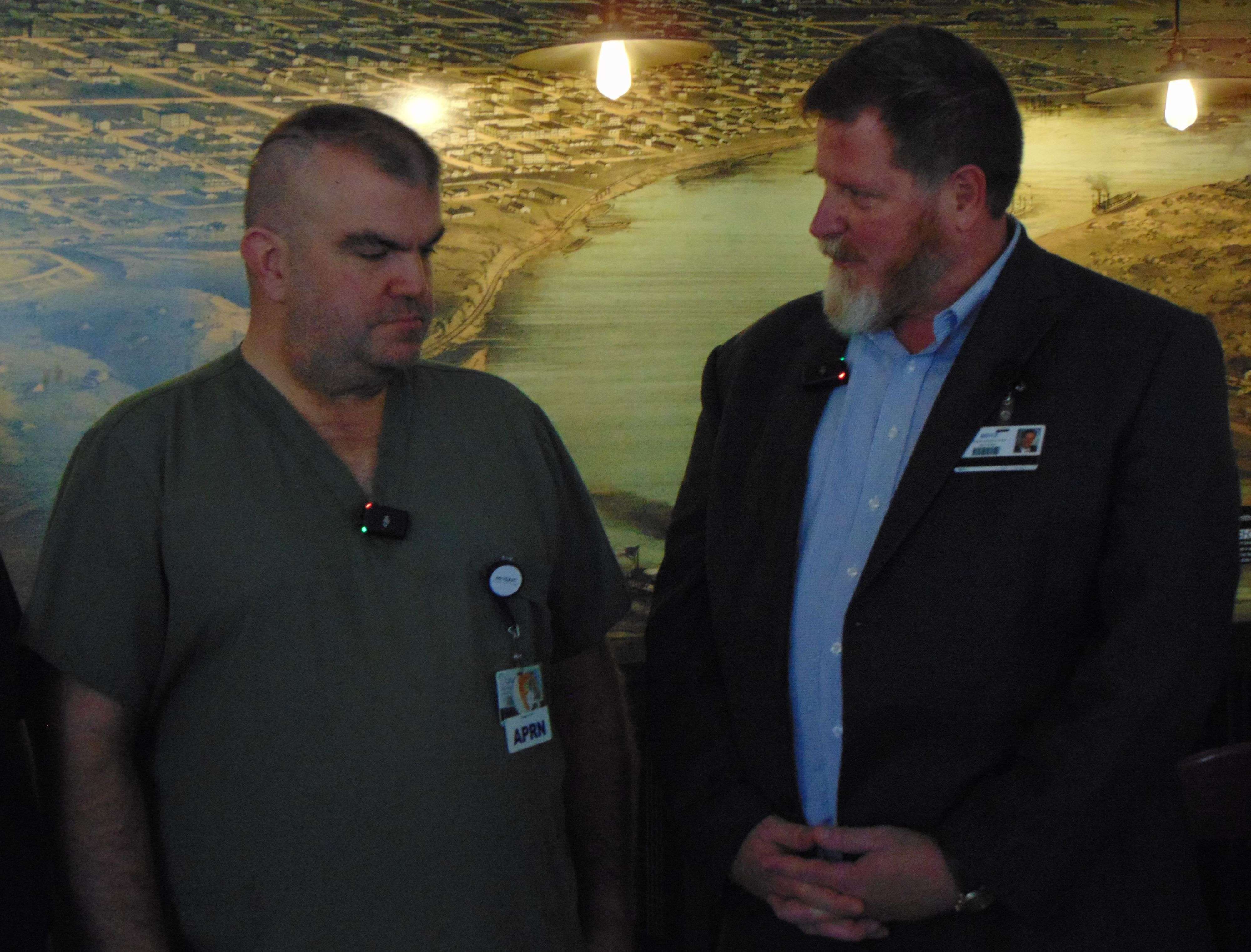 Mosaic CEO Mike Poore (right) speaks with Charles Chatfield during the ceremony to award Chatfield the Servant's Heart/Photo by Brent Martin