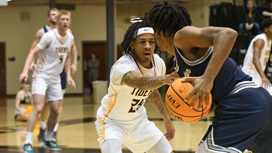 Fort Hays State's Jahiem Holden (24) plays defense in the second half of an NCAA basketball game against Manhattan Christian on Saturday, November 25, 2023 in Hays, Kan. (FHSU Athletics phto/Jaxson Webb)