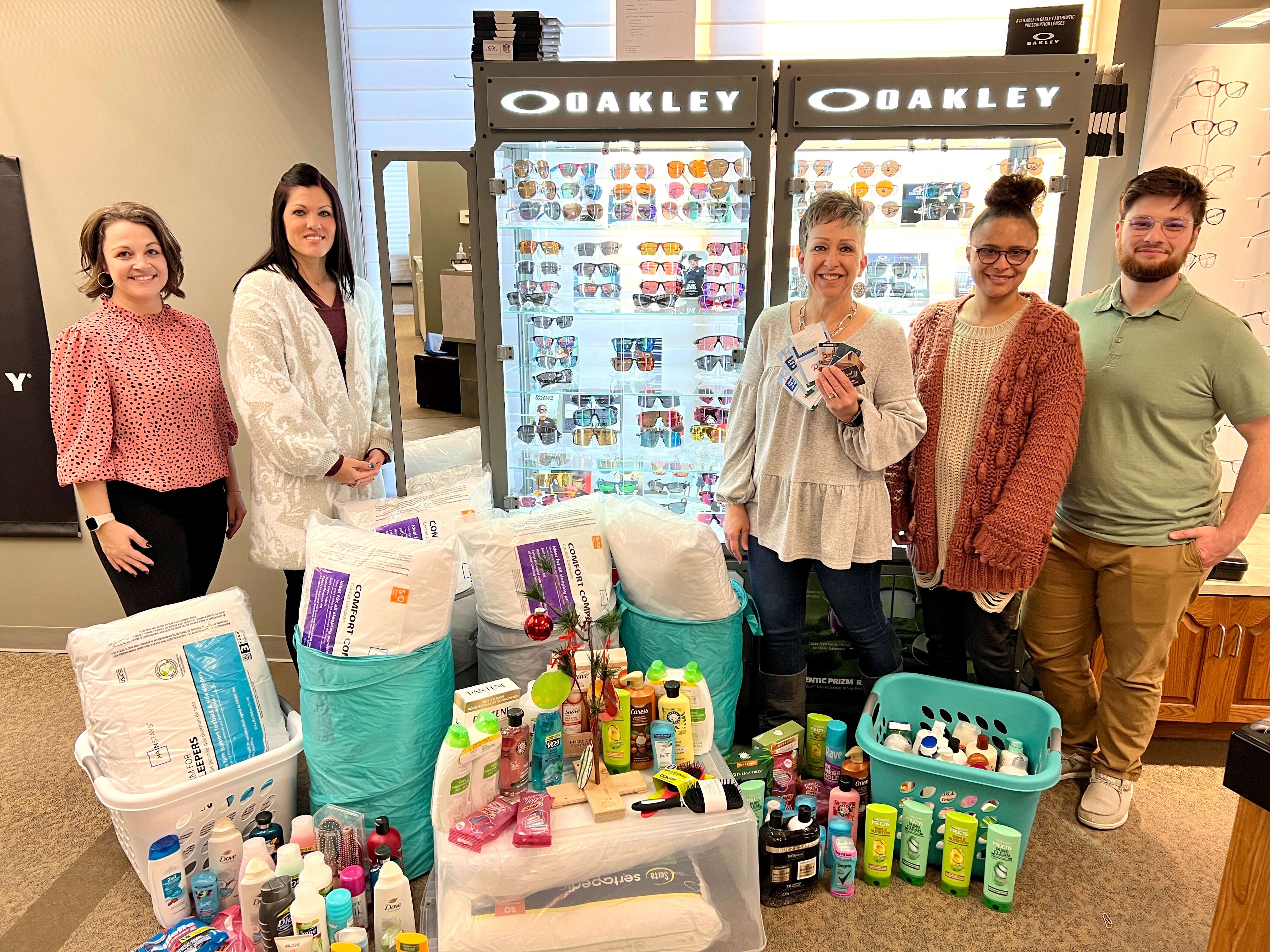 <i>Representatives of the Family Crisis Center, Inc. accept the donated supplies and gift cards from The 10th Street Eyecare Center following a Charity Supply Drive in November.</i>