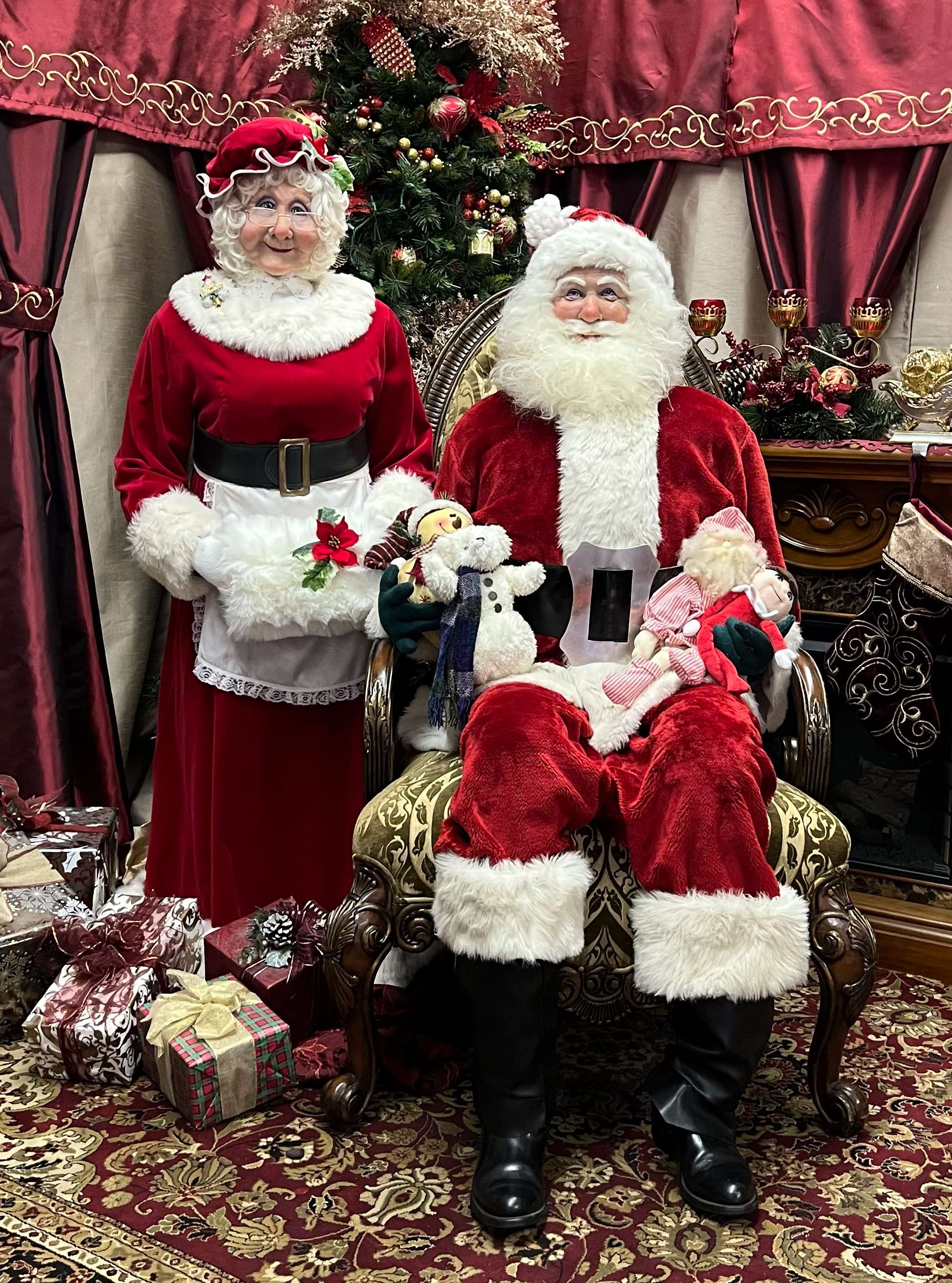 Mrs. Claus and Santa as they now appear at Santas Around the World exhibit in downtown Great Bend. The Claus couple appear in the original (and only) Santa Suits that Randy and Sandy Smith wore, while bringing Christmas joy to community children through several decades.