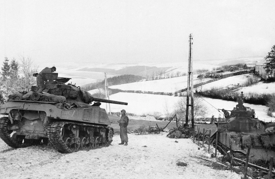 American tank destroyers wait on the snowy slopes of the Bastogne area picture show on Jan. 6,1945 in Bastogne,Belgium, ready to advance toward German lines as soon as the word is given. As they wait Gen. Patton’s men slowly forge ahead into the German salient. (AP Photo)