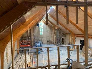 Progress continues on construction at First Southern Baptist Church in Great Bend following the July 16 storm that ripped off the structure's roof and caused damage inside. The church will hold Christmas Eve services at the Crest Theater.