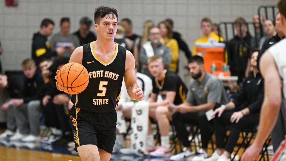 Fort Hays State's Kaleb Hammeke brings the ball up the floor in the first half of an NCAA college basketball game against Newman on Sunday, December  17, 2023 in Wichita, Kan. (FHSU Athletics photo/Ryan Prickett)