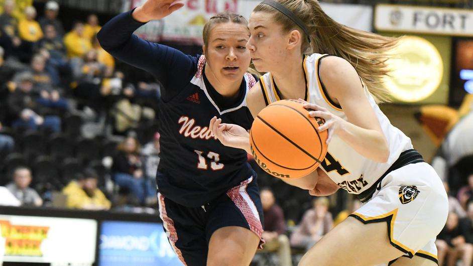 Fort Hays State's Kate Dilsaver (4) drives towards the basket vs. Newman on Thursday, Dec. 18, 2022 in Hays, Kan. (FHSU Athletics photo/Nicole Heitmann)