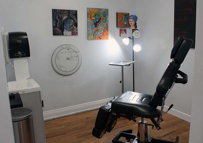 A piercing room at Blue Light Body Art at its new location in downtown Hays. The studio has three piercers and four tattoo artists on staff. Photo by Cristina Janney/Hays Post