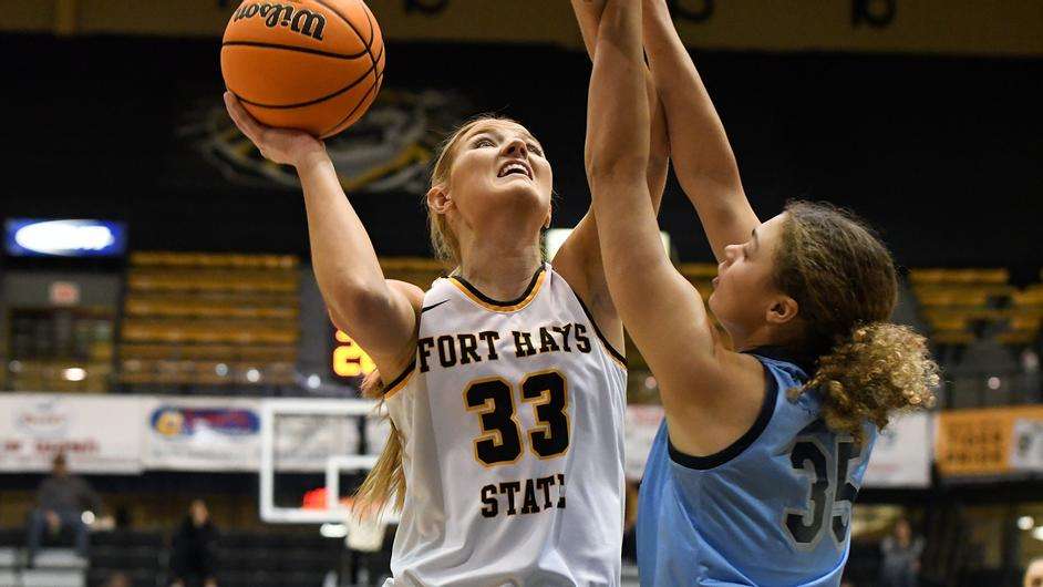 Fort Hays State center Olivia Hollenbeck (33) attempts a shot vs. Lincoln February 9, 2023 in Hays, Kan.. (FHSU Athletics photo/Jaxson Webb)