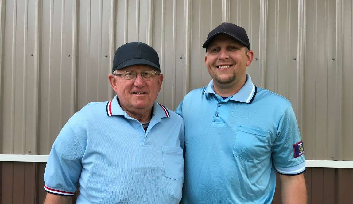 Mark Goodheart (left), pictured with his son Scott, also a sports official.