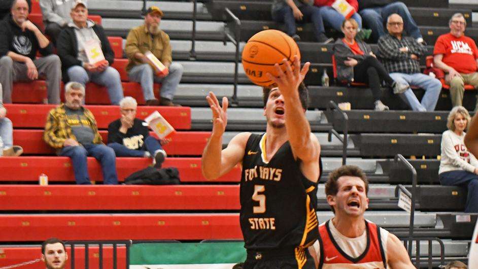 Fort Hays State guard Kaleb Hammeke (5) goes in for a layup in an MIAA basketball game vs. Central Missouri on December 31, 2022 in Warrensburg, Mo. (FHSU Athletics photo/Seth Kincaid)