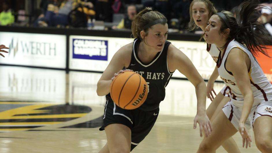 Fort Hays State guard Brooke Loewe drives to the basketball in an NCAA basketball game vs. Minnesota State on November 18, 2022 in Hays, Kan. (FHSU Athletics photo/Nicole Heitmann)