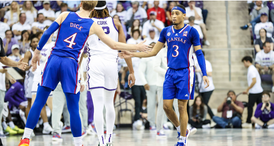 Kansas guards Gradey Dick (4) and Dejuan Harris (3) congratulate one another during a Big 12 basketball game on Monday, Feb. 20, 2023 in Fort Worth, Texas. (Kansas Athletics photo)
