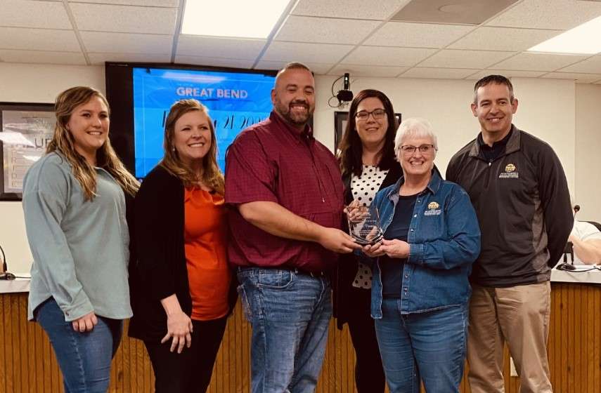 Linda Penner (2nd from the right) was presented the 2022 Frontline Employee of the Year award by the Great Bend Convention & Visitors Bureau on Tuesday, Feb. 21, 2023.