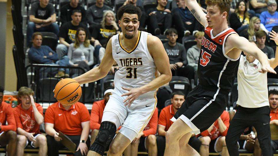 Fort Hays State center Iyen Eneruna drives to the basketball in an MIAA basketball game vs. Central Missouri in Hays, Kan. on February 11, 2023. (FHSU Athletics photo/Nicole Heitmann)