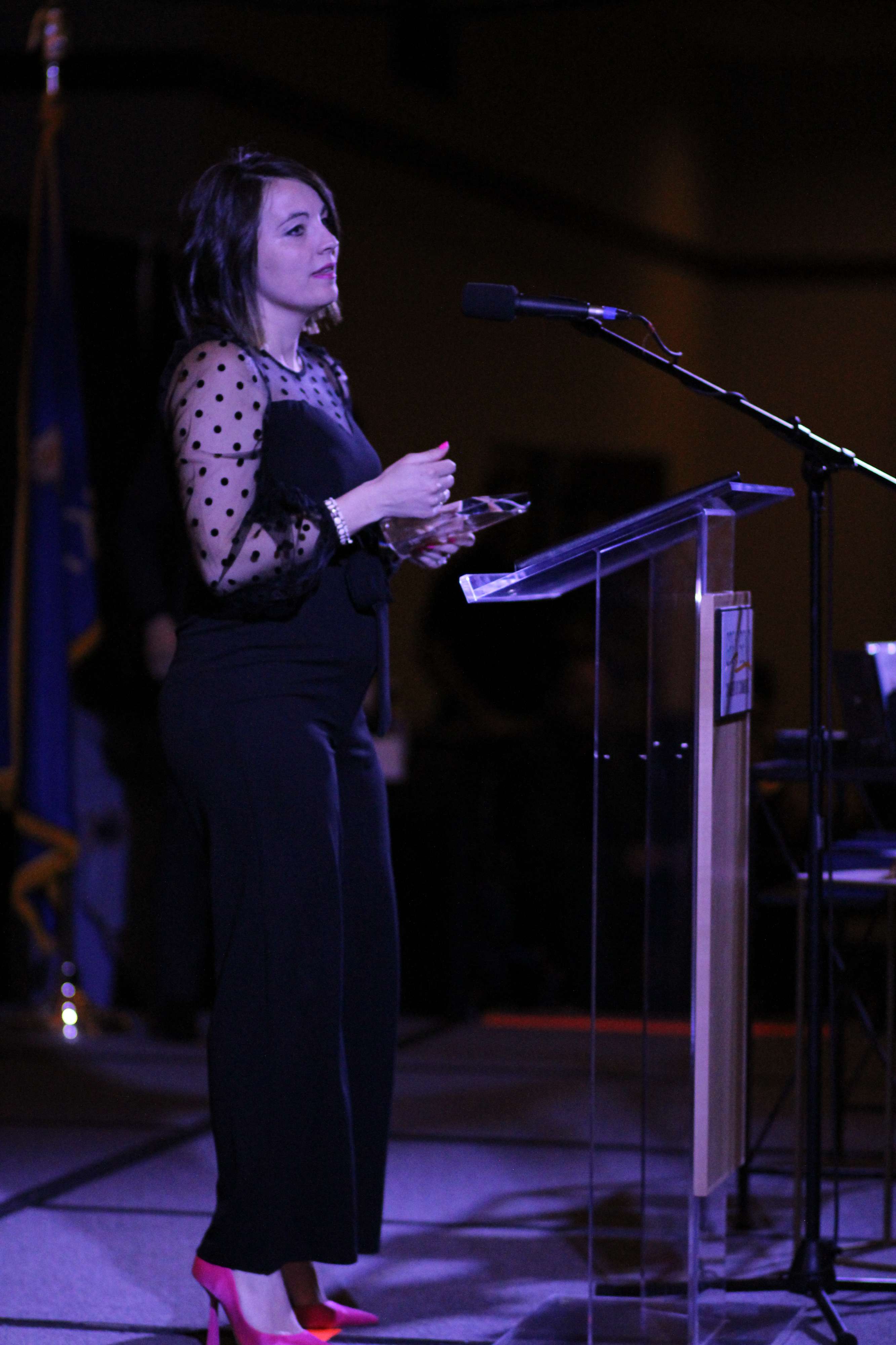 Megan Hammeke accepts the 2022 NextGen Leader of the Year award at the Great Bend Chamber of Commerce Banquet on Feb. 25, 2023.