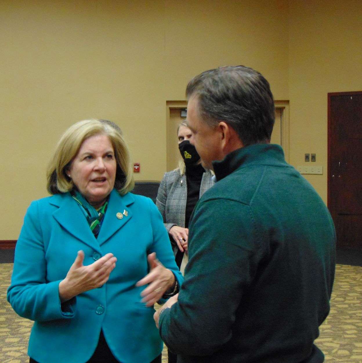 Esther George speaks to a member of the audience after a speech at Missouri Western State University/file photo