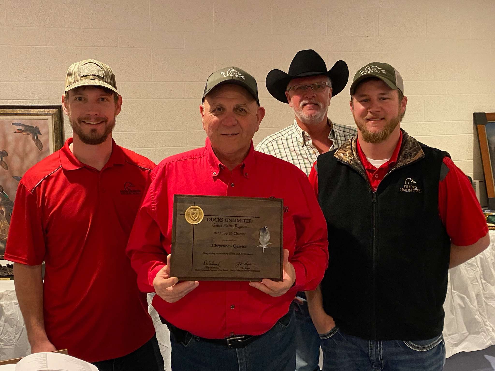 Ducks Unlimited District Chair Jerry Ney (holding plaque) with Cheyenne-Quivira Chapter Co-Chair Billy Eldridge (left).