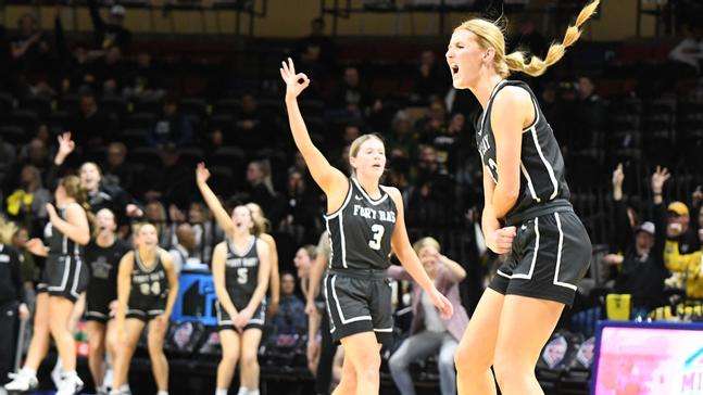 Fort Hays State's Olivia Hollenbeck (33) and Sydney Golladay (3) celebrate after a 3-point basket in the MIAA Tournament quarterfinals vs. Missouri Western State at Municipal Auditorium in Kansas City, Mo. on March 3, 2023.( FHSU Athletics photo/Nicole Heitmann)