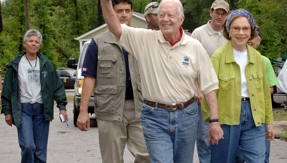 Former President Jimmy Carter and his wife, Rosalyn, at a “build” for Habitat for Humanity in Mississippi. (Courtesy of George Hipple Photography)