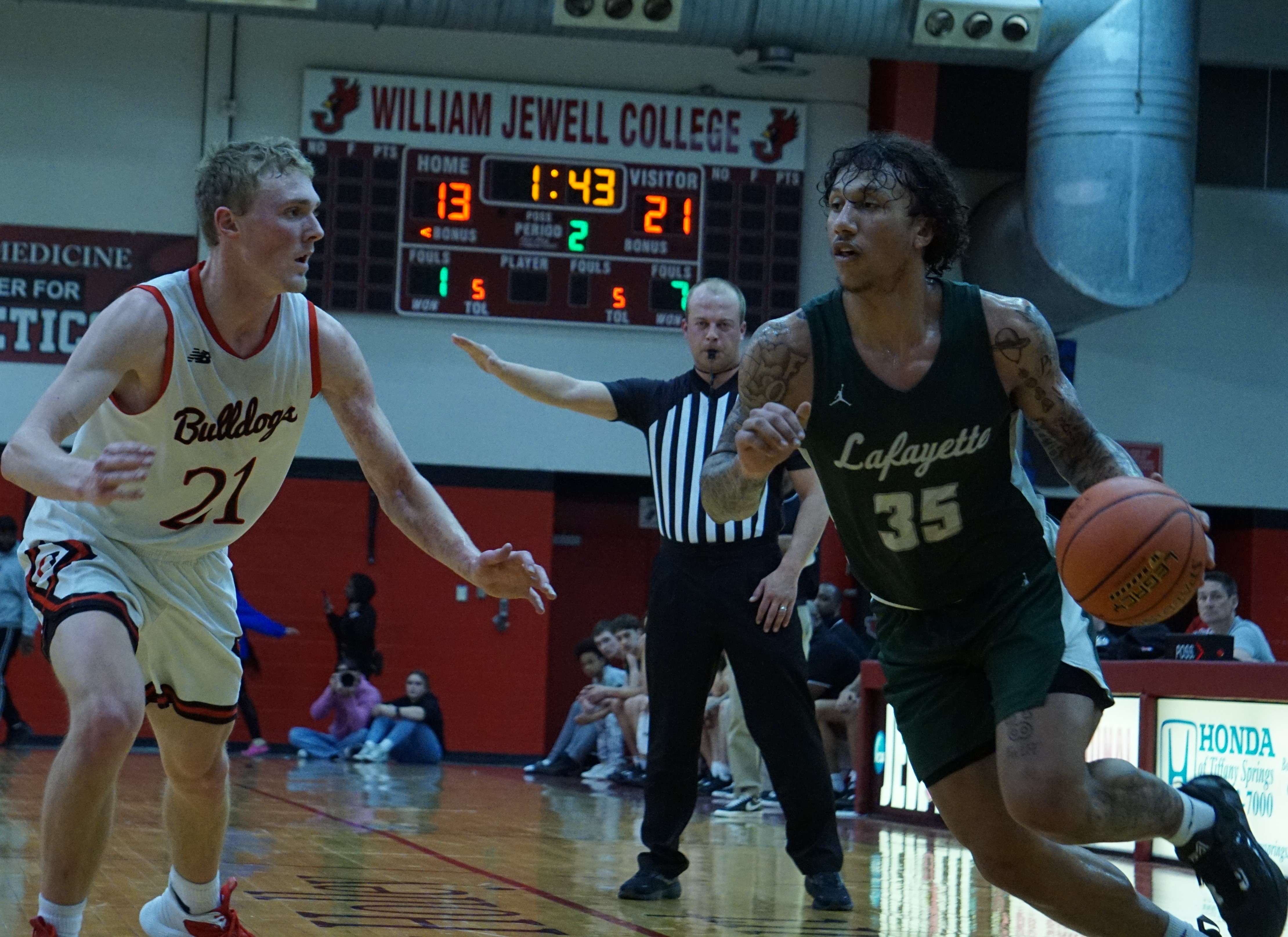 Lafayette's Camden Bennett (35) drives in the first half of Tuesday's Class 4 sectional game against Odessa at the Mabee Center in Liberty. Photo by Tommy Rezac.