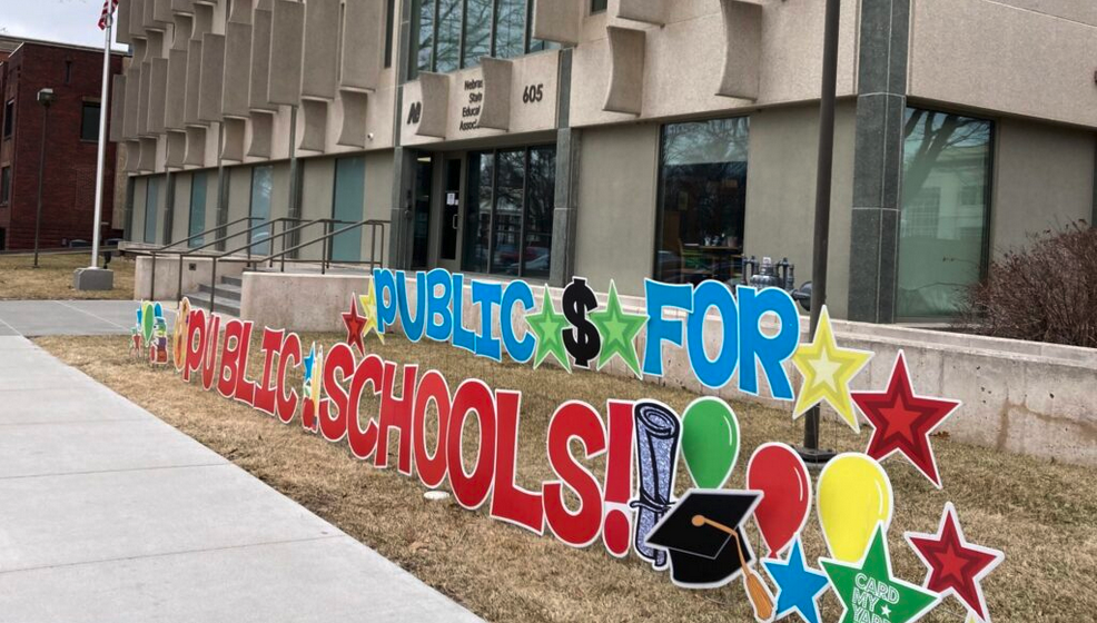 This sign popped up Monday on the lawn of the state teachers’ union as debate began on a bill granting tax credits for donations for private school scholarships. (Paul Hammel/Nebraska Examiner)