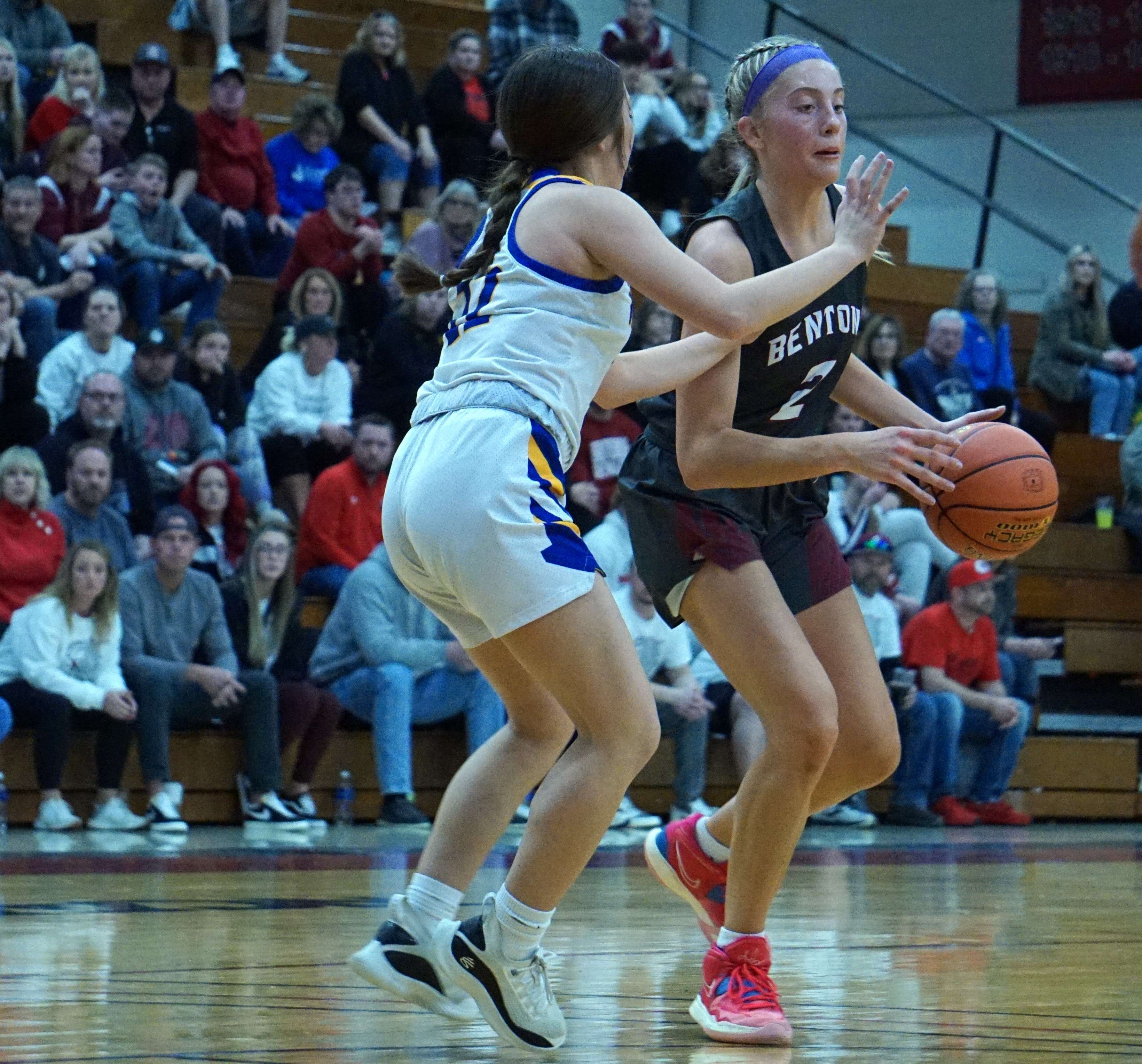 Kelsey Johnson (2) tries to dribble against a defender in Tuesday's sectional game against St. Pius X. Photo by Tommy Rezac.