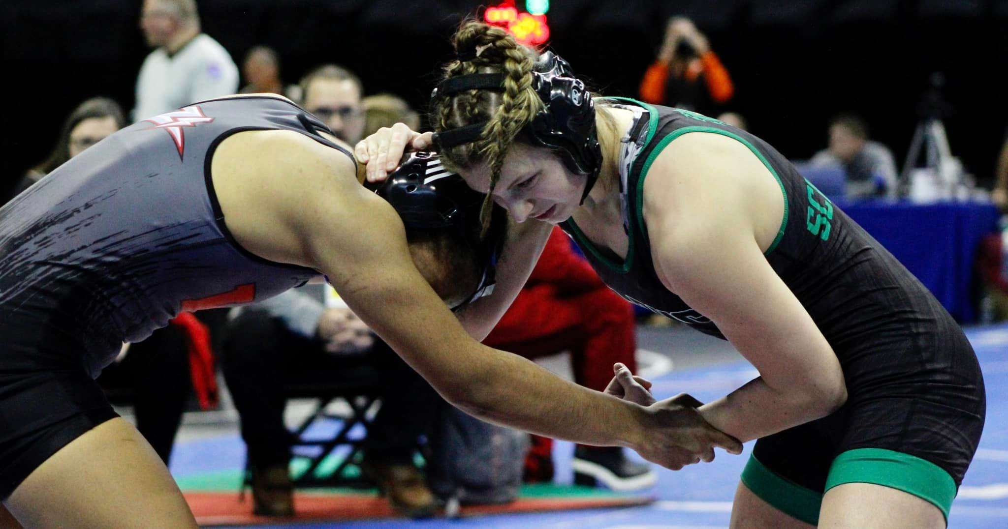 Kalli Schuster (right) wrestles in the MSHSAA state championships at Mizzou Arena on Feb. 23. Photo by Chris Roush.