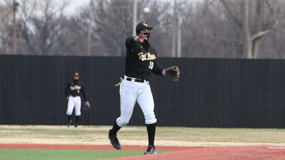 Fort Hays State junior Zane Knox (10) throws the ball across the diamond in an MIAA baseball game vs. Rogers State Saturday, March 11, 2023 at Larks Park in Hays, Kan. (FHSU Athletics photo/Nicole Heitmann)
