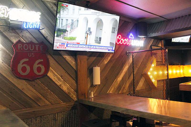 The Social Tavern has a full bar, beers on tap as well as additional beers in bottles and cans. Photo by Cristina Janney/Hays Post