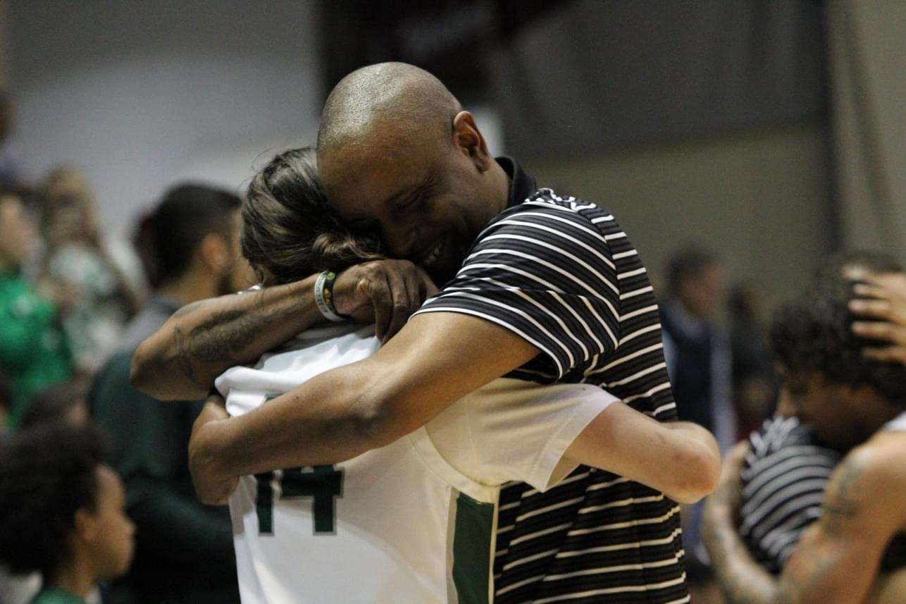 Lafayette coach Kevin Bristol and George Galloway embrace during the medal ceremony. Photos by Clifton Grooms.