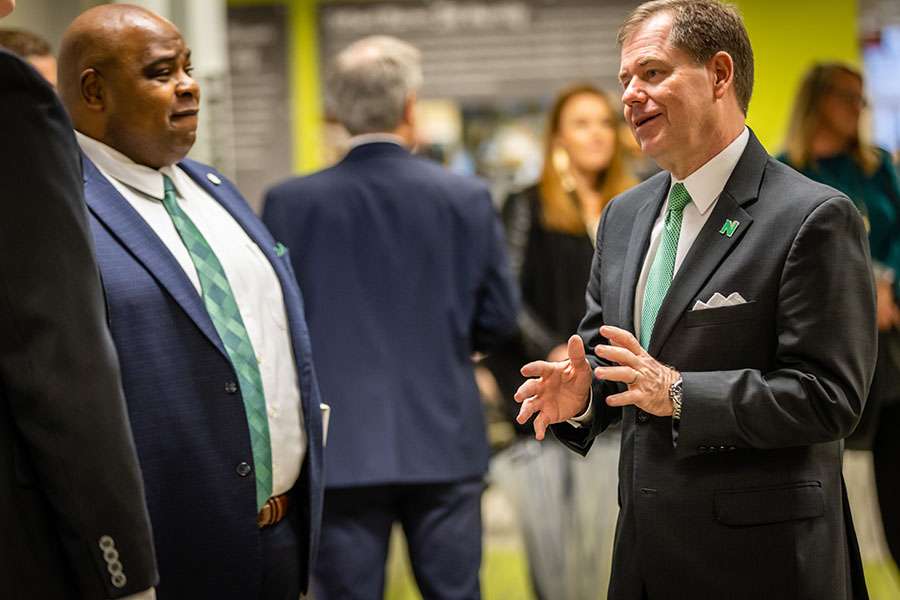 In coming NWMSU President Lance Tatum speaks with interim President Clarence Green/Photo by Todd Weddle, NWMSU