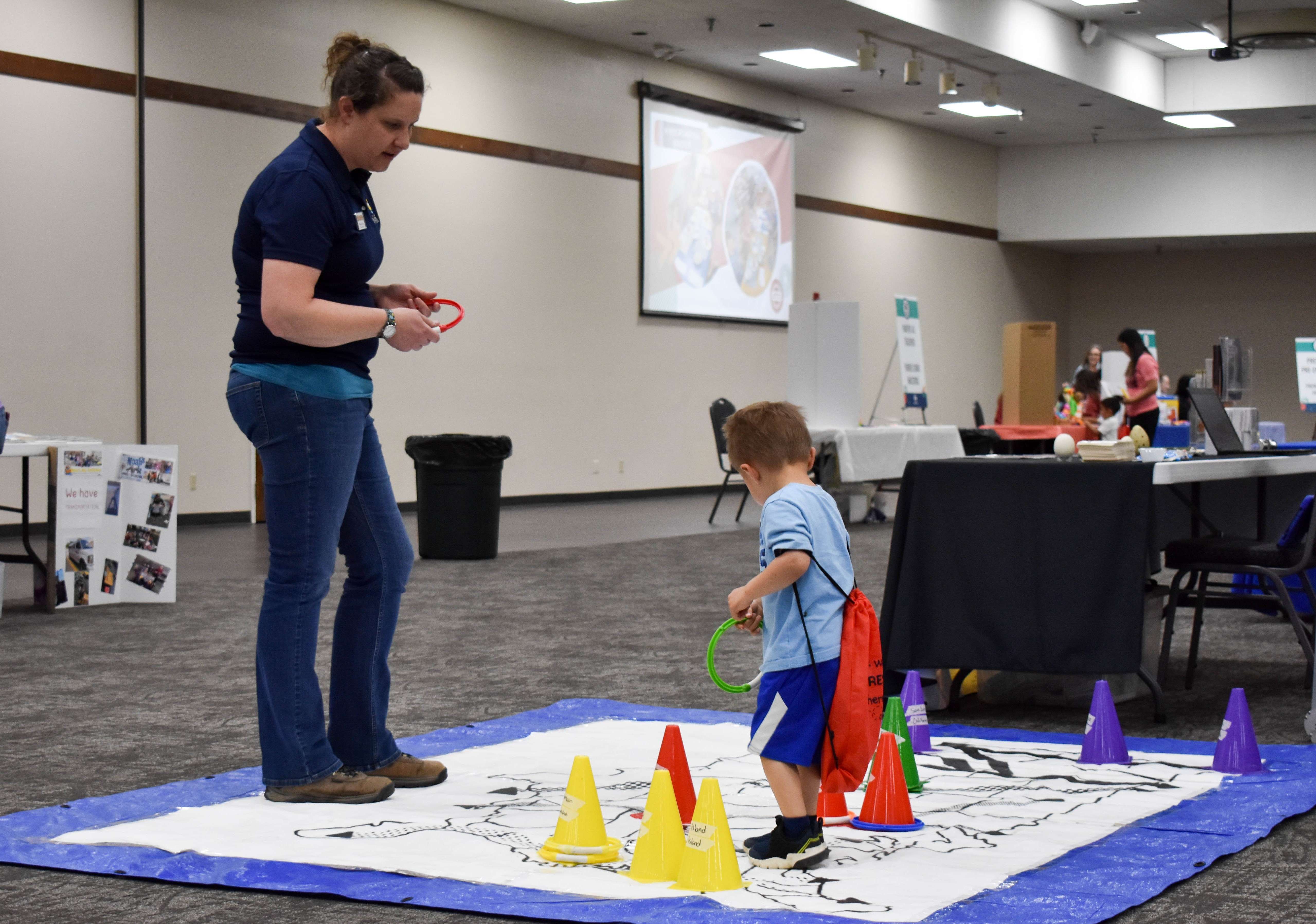 Showcasing enrichment opportunities for young learners, the Kansas Wetlands Education Center will provide another engaging display at this year's event. Pictured here, Mandy Kern, KWEC.