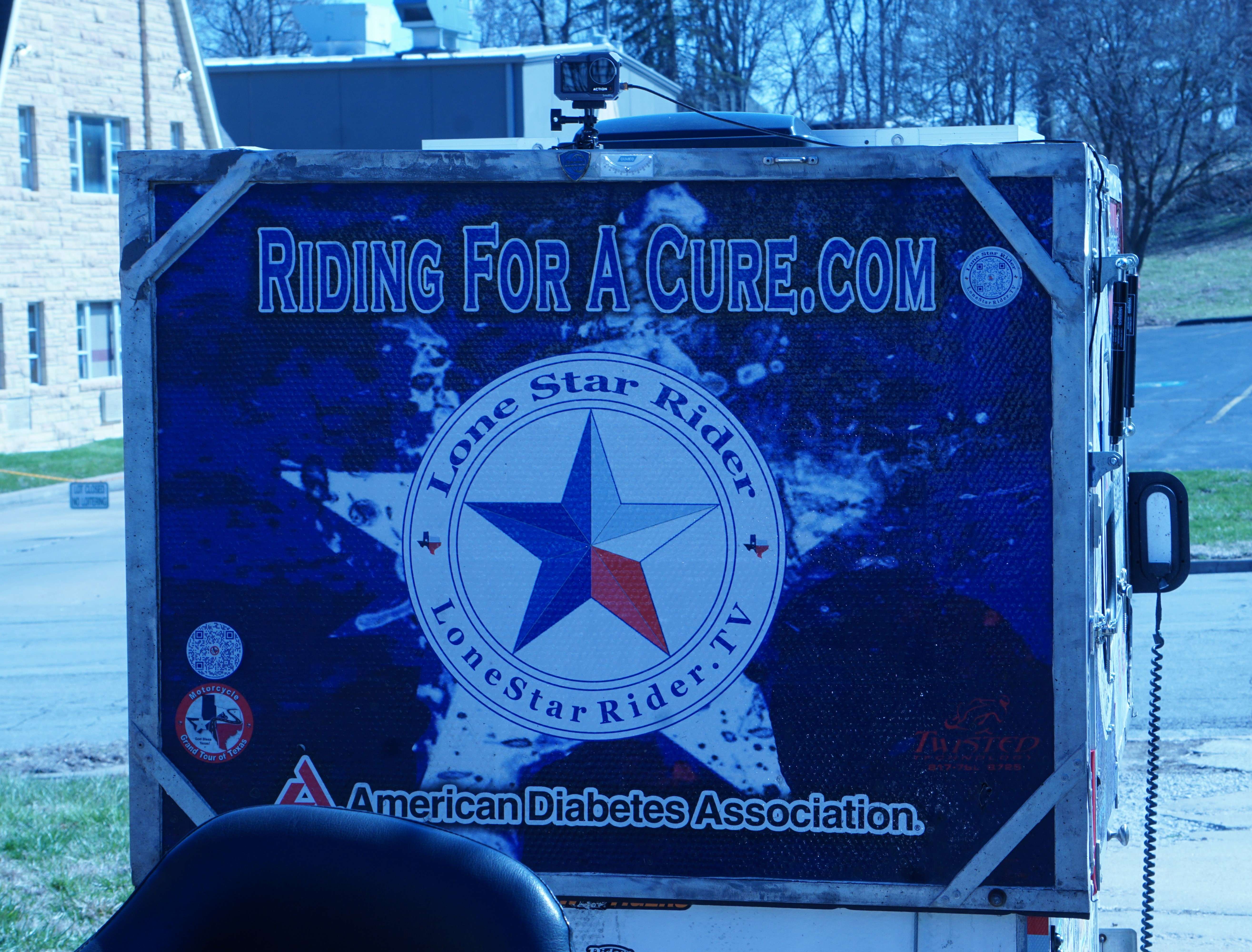 Rex Covington travels the country with this trailer trailing behind his bike, camping overnight in it, raising money for the American Diabetes Association/ Photo by Matt Pike