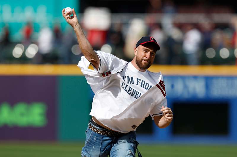 <b>Kansas City Chiefs tight end Travis Kelce throws out the ceremonial first pitch before a baseball game between the Cleveland Guardians and the Seattle Mariners Friday in Cleveland.</b> (AP Photo/Ron Schwane)