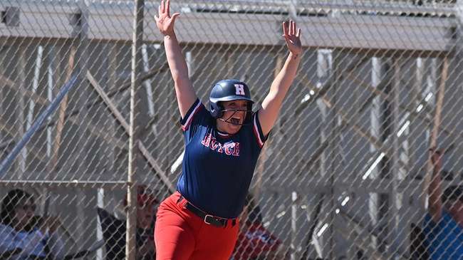 Jaeleigh Darnell celebrates after hitting a three-run home run in Game 1 of a KJCCC doubleheader sweep over Barton on Wednesday at Fun Valley. (Andrew Carpenter/Blue Dragon Sports Information)