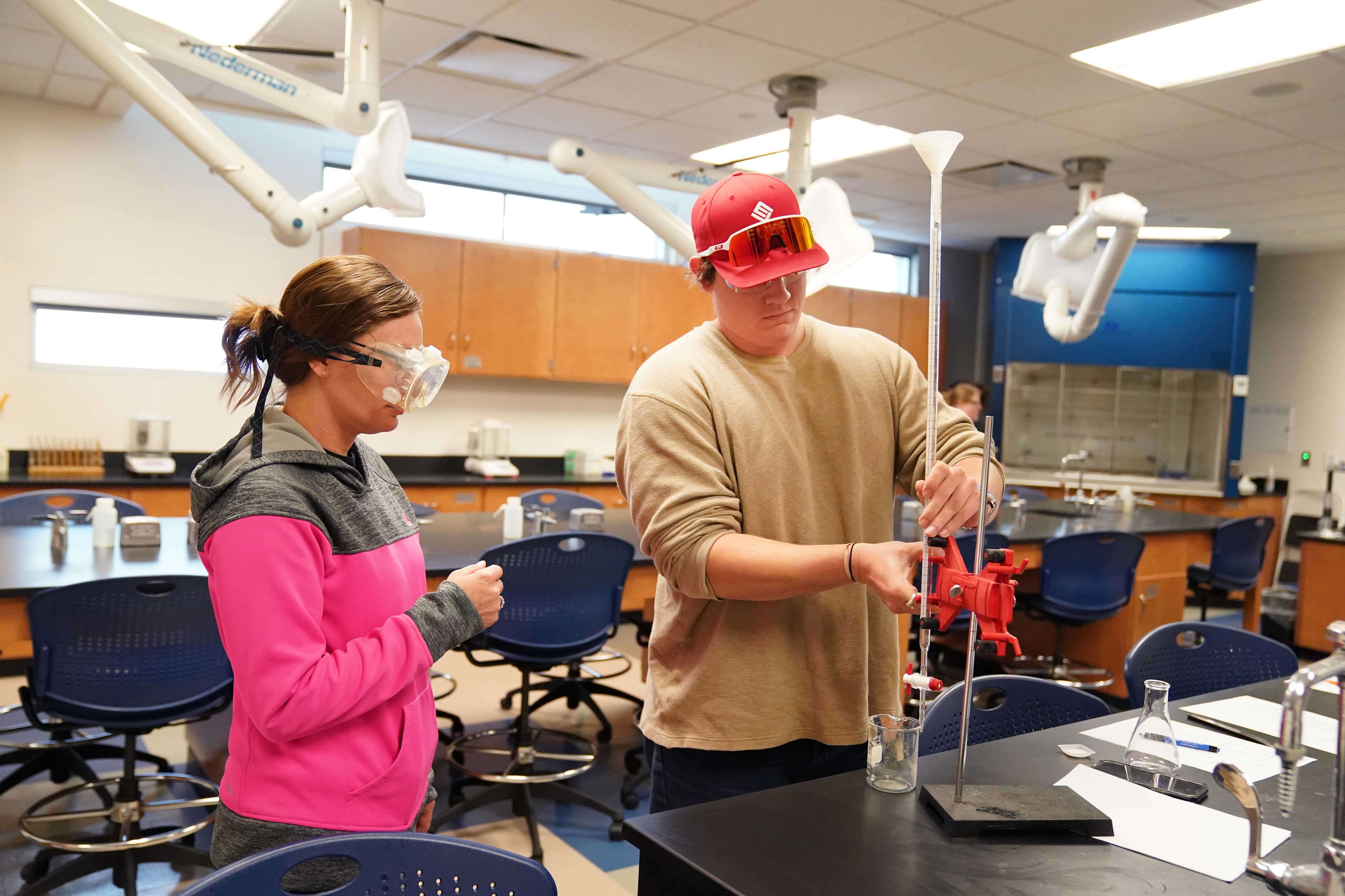 Mid-Plains Community College students conduct a chemistry experiment. MPCC has extended its scholarship deadline to June 1.