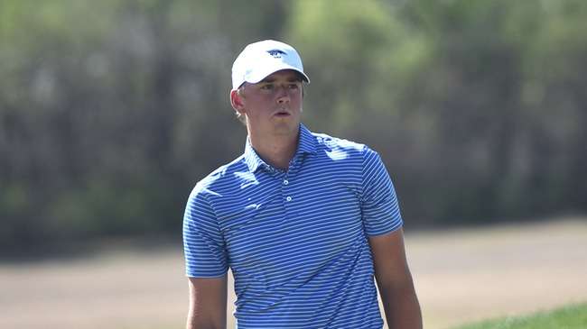 Alex Lindstrom watches a long birdie putt attempt on hole No. 13 roll to within a foot on Monday in the second round of the Jayhawk Championship at Sand Creek Station in Newton. (Steve Carpenter/Blue Dragon Sports Information)