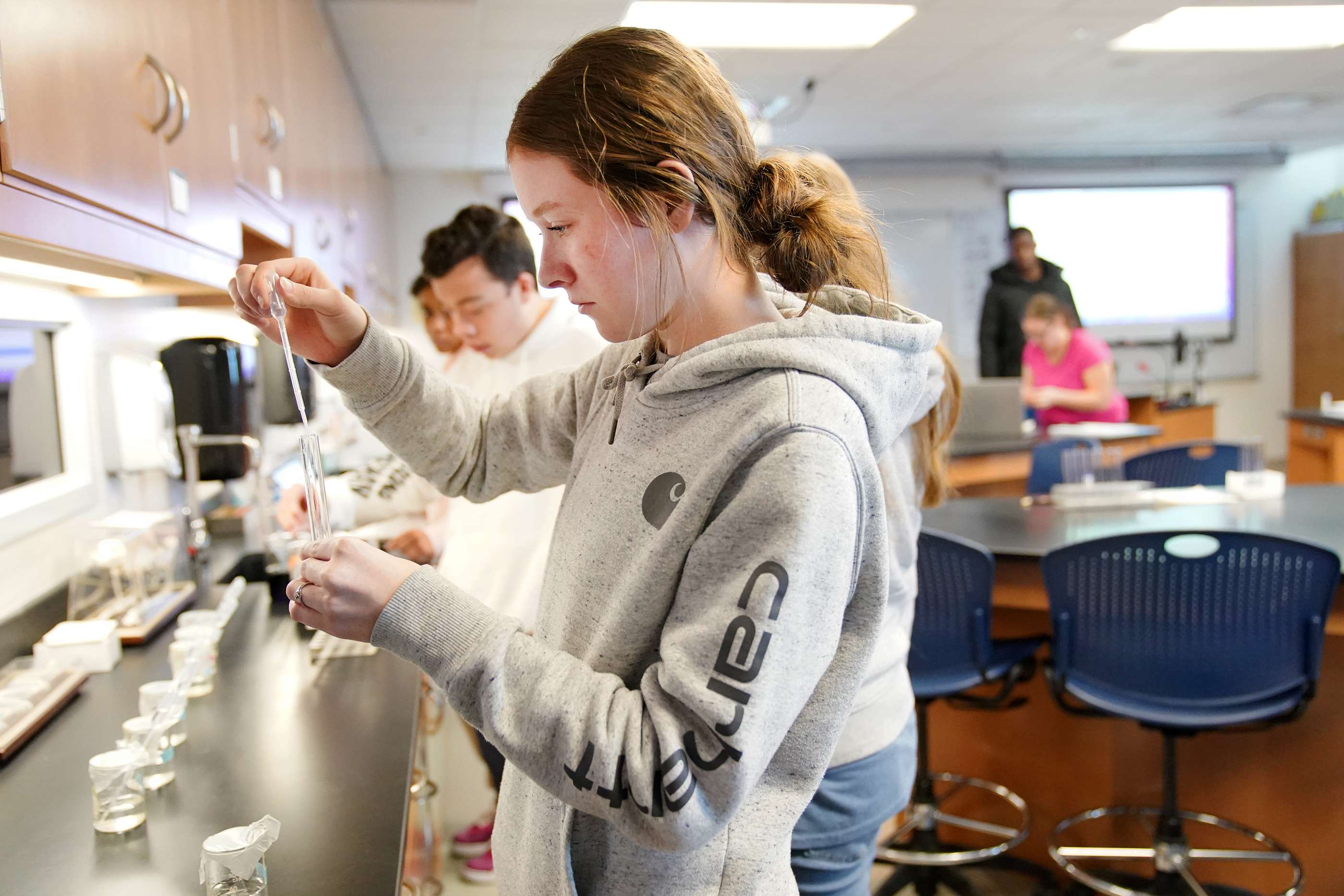 Mid-Plains Community College student Kaylee Johnson, of Ogallala, pipettes pH buffer to prepare a visual pH color scale in a biology class in North Platte. MPCC and the University of Nebraska at Kearney have entered into a two-plus-two Guided Pathway agreement for biology.