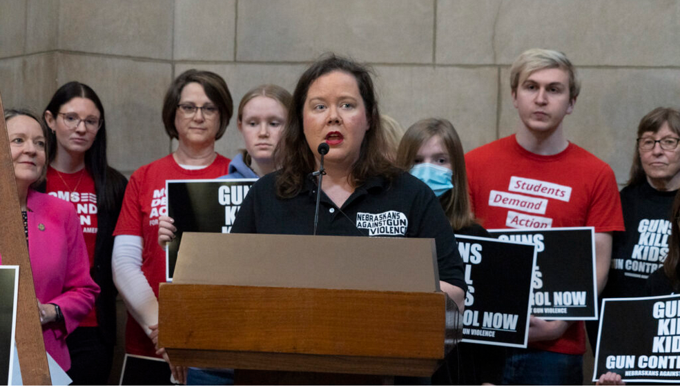 Melody Vaccaro, executive director of Nebraskans Against Gun Violence, joins students, State Sen. Jane Raybould of Lincolna and members of the community to discuss gun reforms on Thursday, March 16, 2023, in Lincoln. The groups called for action to prevent gun violence. (Zach Wendling/Nebraska Examiner)