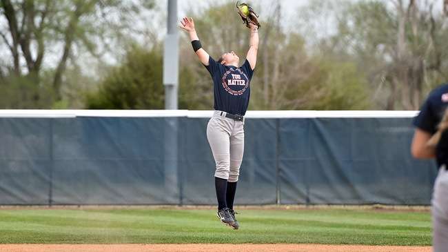 In a day full of offensive superlatives, Blue Dragon shortstop Madison Grimes jumps high to snag a line drive and protect a combined perfect game in the No. 15 Blue Dragons' 30-0 win over Northwest Tech on Wednesday at Fun Valley. (Sammi Carpenter/Blue Dragon Sports Information)