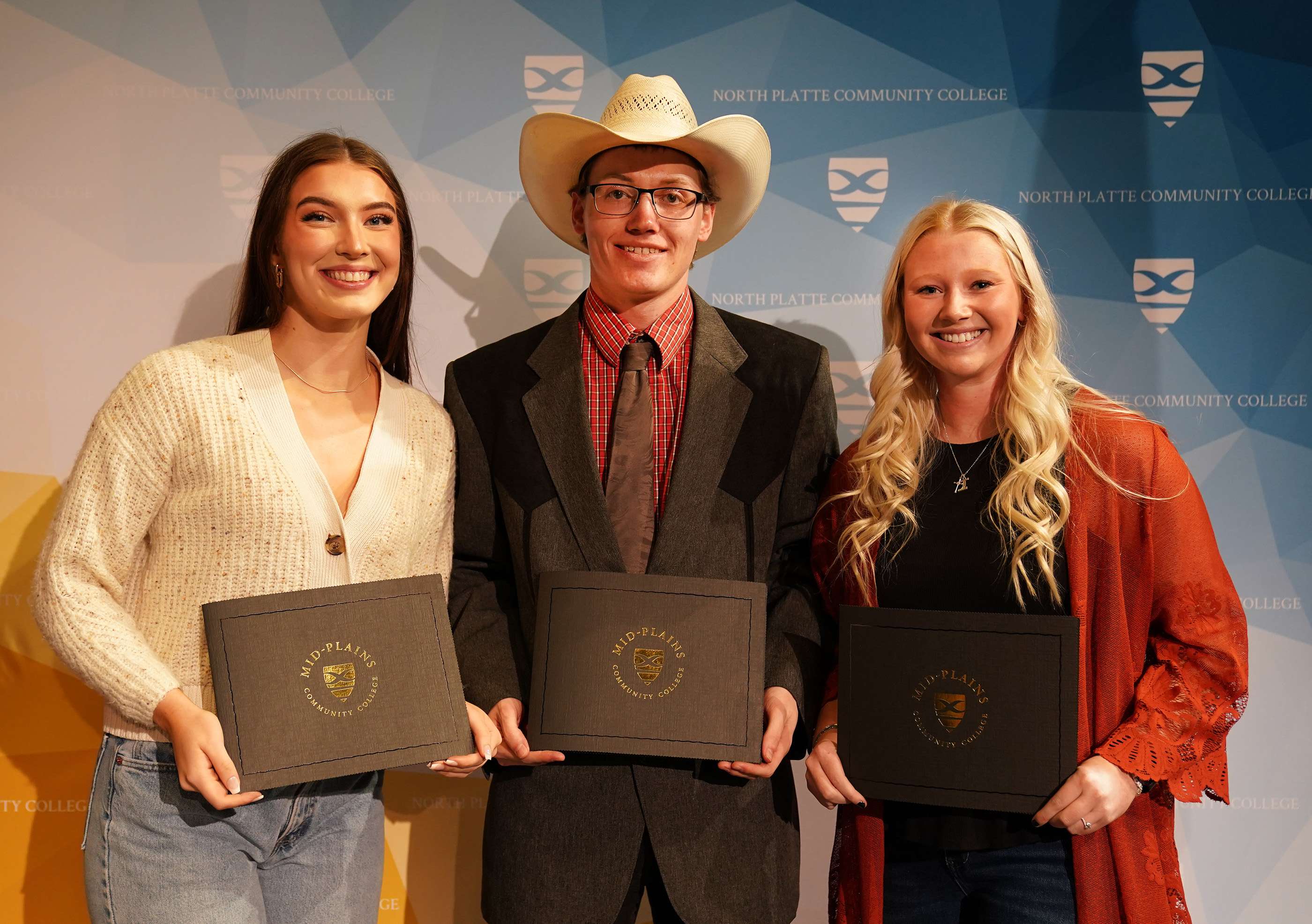 Vice President of Student Services Award winner Karley Spillane, Presidential Award recipient Josiah Wriedt and Vice President of Instruction Award winner Tessa Metschke are recognized during the North Platte Community College Honors Convocation Monday afternoon on the NPCC South Campus.