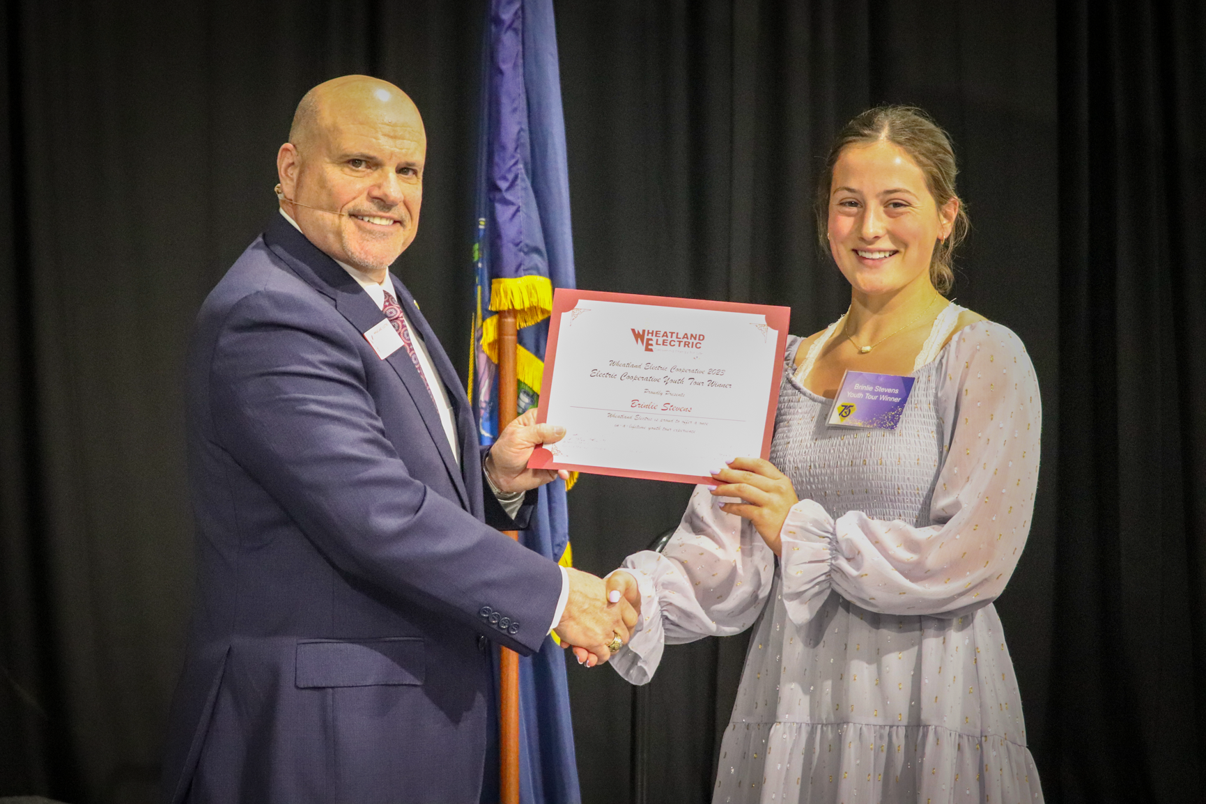 Scott Community High School junior Brinlie Stevens (right) was recognized by Wheatland Electric Cooperative CEO Bruce Mueller for being selected to represent WEC at this year's Electric Cooperative Youth Tour in Washington D.C.