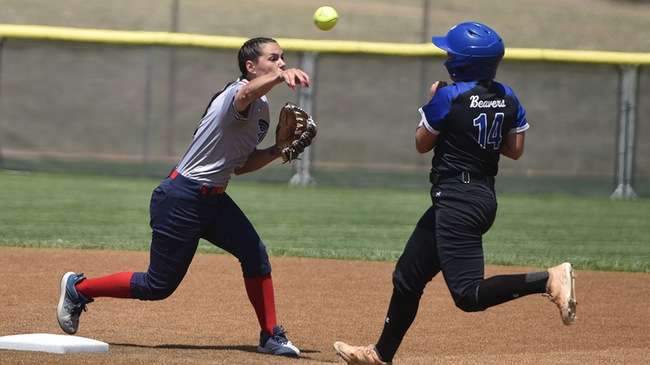 Shortstop Madison Grimes turns a pivot at second in No. 14 Hutchinson's 15-4 run-rule victory over Pratt in the opening round of the Region VI Tournament on Friday in Dodge City. (Steve Carpenter/Blue Dragon Sports Information)<br>