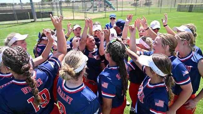 The Blue Dragon softball team meets for the final time in the outfield at Dodge City's Legends Park after a 6-5 loss to Butler in the Region VI Tournament finals. (Andrew Carpenter/Blue Dragon Sports Information)<br>